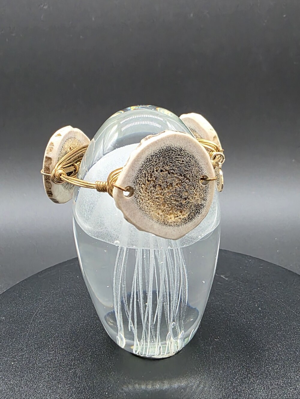Bourbon and Boweties gold-plated wire bangle featuring a sliced antler cross-sec